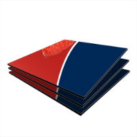 Stack of Aluminium Composite Material panels, red and blue, with a strawberry image on the top panel.