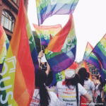 parade crowd flags