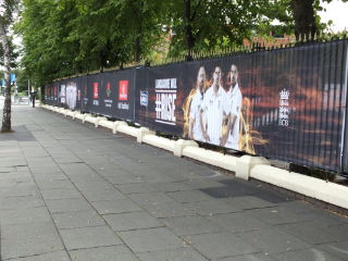 Heras Mesh Banners used for branding on an long stretch of balustrades